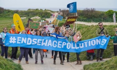 Campaigners take part in a Surfers Against Sewage demonstration in Newquay