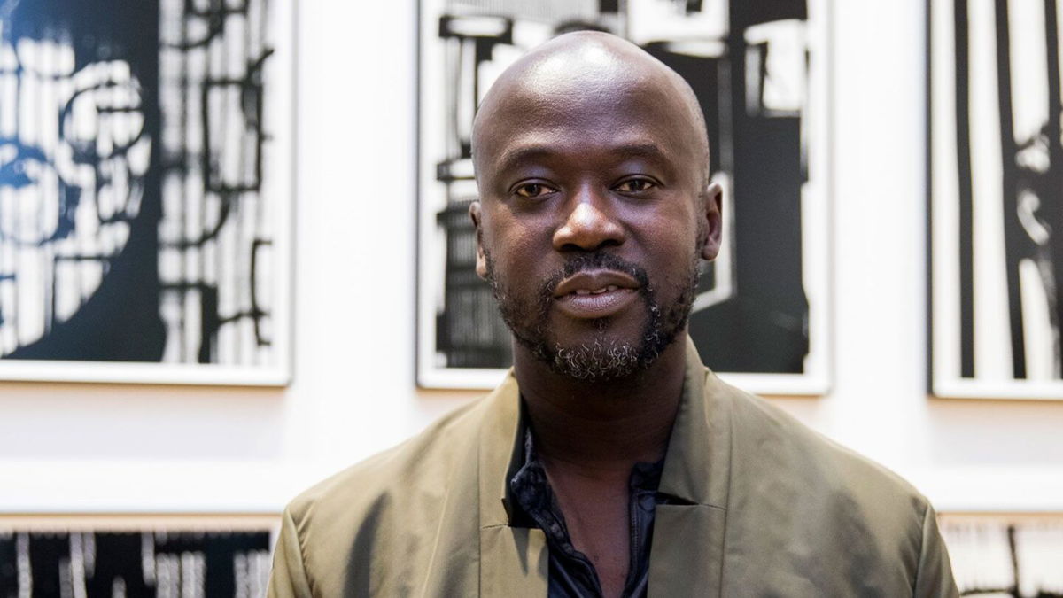<i>Tristan Fewings/Getty Images/FILE</i><br/>David Adjaye attends the opening of an exhibition during Frieze Week in October 2018 in London. Adjaye has stepped back from several projects following allegations of sexual harassment or assault lodged against him by three unnamed former employees.