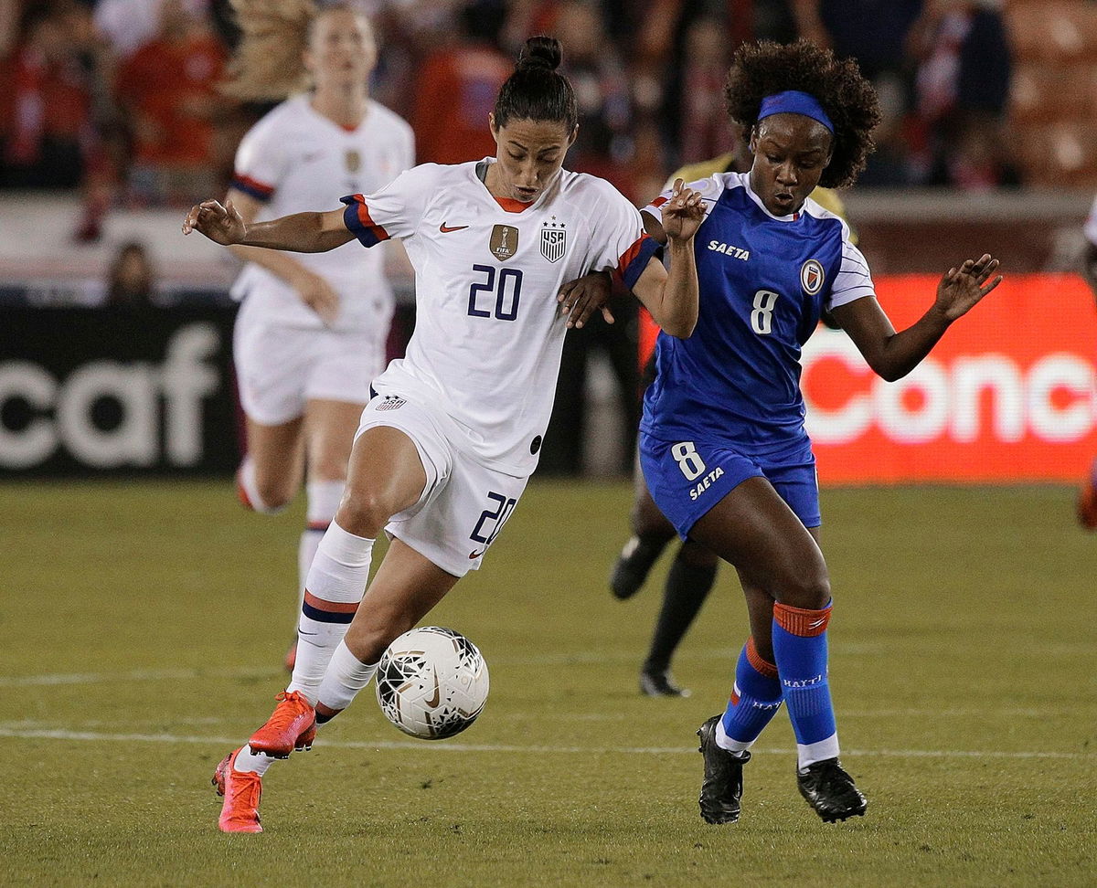 <i>Bob Levey/Getty Images</i><br/>Etienne (right) competes with the USWNT's Christen Press for the ball during an Olympic qualifying match in January 2020.