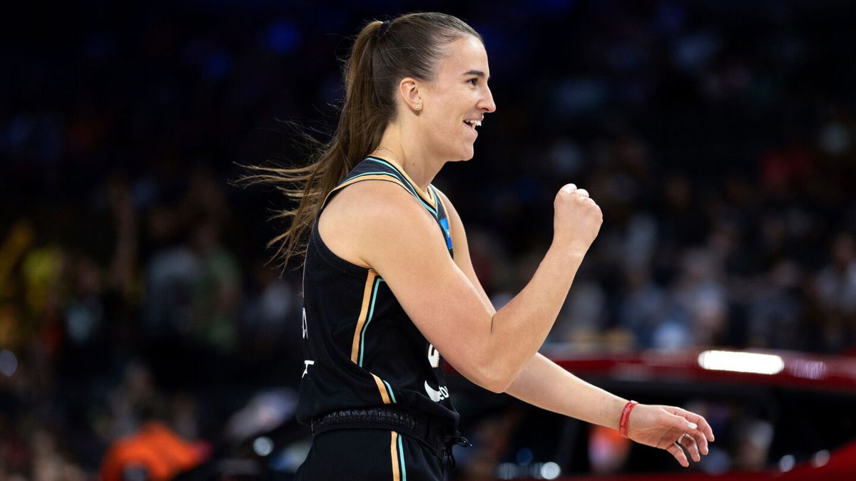 <i>Ellen Schmidt/AP</i><br/>Sabrina Ionescu celebrates after competing in the WNBA All-Star skills event.