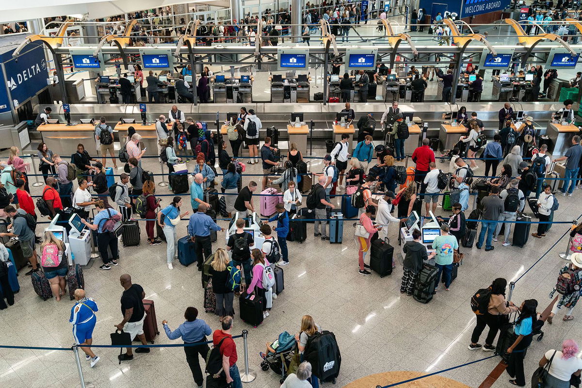 Travelers at Hartsfield-Jackson Atlanta International Airport  in Atlanta, Georgia, on May 25, 2023 as long airport lines, jammed planes, higher fares and potential flight delays are set to plague the coming summer travel season.