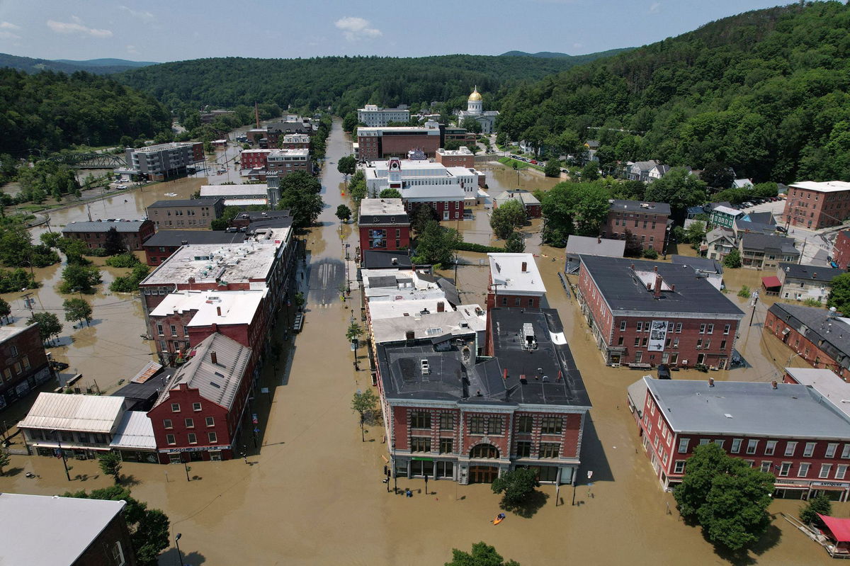 <i>Brian Snyder/Reuters</i><br/>Streets are seen  flooded by recent rainstorms in Montpelier