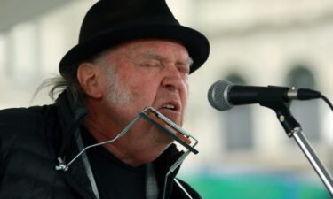 Neil Young is seen here performing at an environmental rally in British Columbia in February.