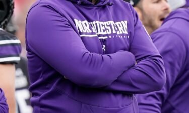 Former Northwestern University head football coach Pat Fitzgerald watches during a game against Ohio State on November 5