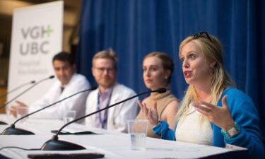 MoCrazy speaking at a news conference at Vancouver General Hospital on July 19