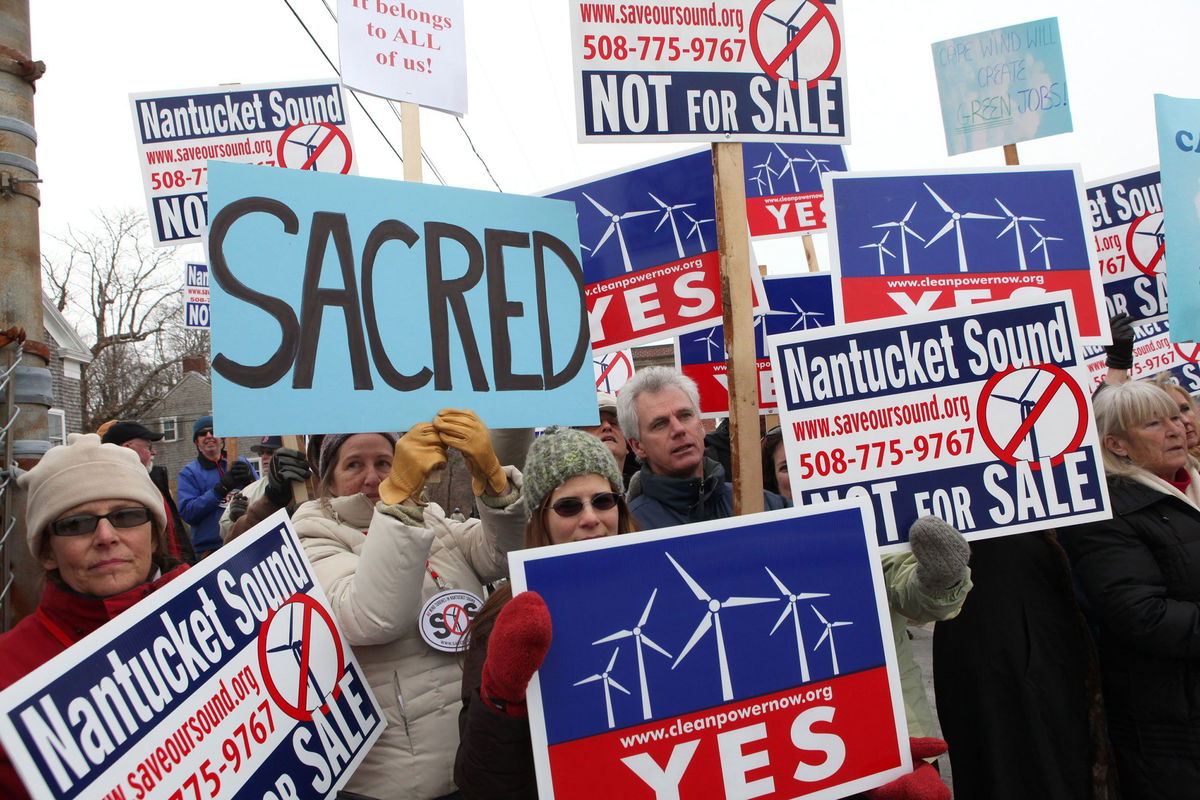 <i>Julia Cumes/AP</i><br/>Supporters and opponents of the Cape Wind project protested outside the US Coastguard Station in Woodshole