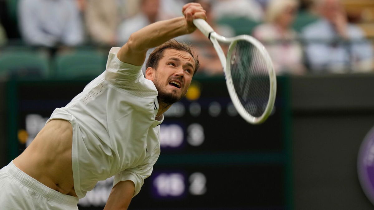 <i>Alastair Grant/AP</i><br/>Russia's Daniil Medvedev in action against Christopher Eubanks of the US at Wimbledon.