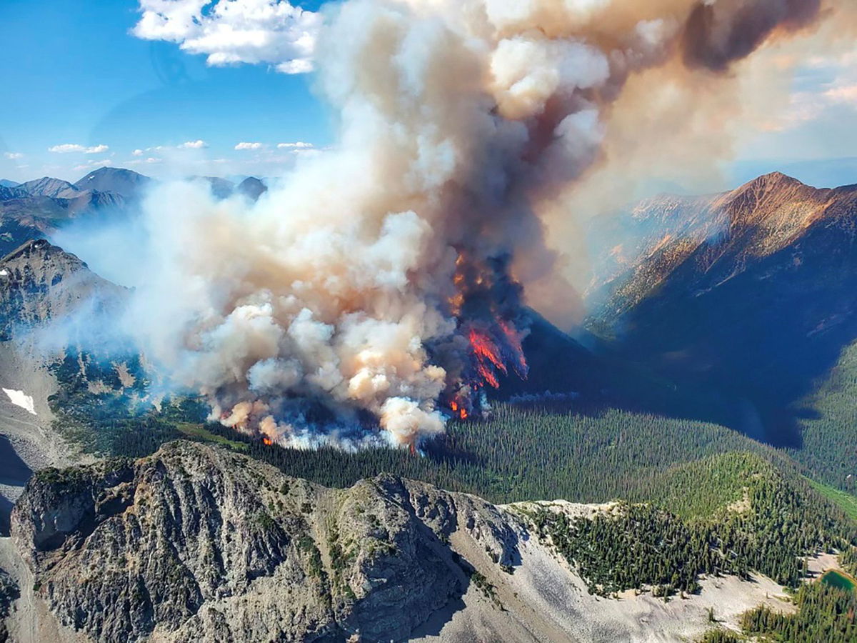 <i>BC Wildfire Service/Reuters</i><br/>Smoke rises from the Texas Creek wildfire in British Columbia earlier this month.