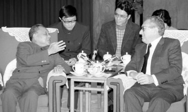 China's late paramound leader Deng Xiaoping met with former US Secretary of State Henry Kissinger in Beijing on November 11