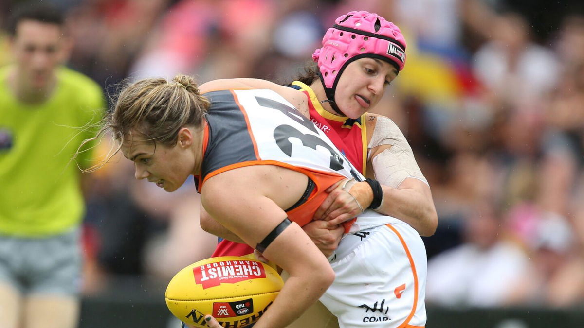 <i>James Elsby/AFL Photos/Getty Images</i><br/>Heather Anderson wore a pink helmet so her vision-impaired mother could see her on the pitch.