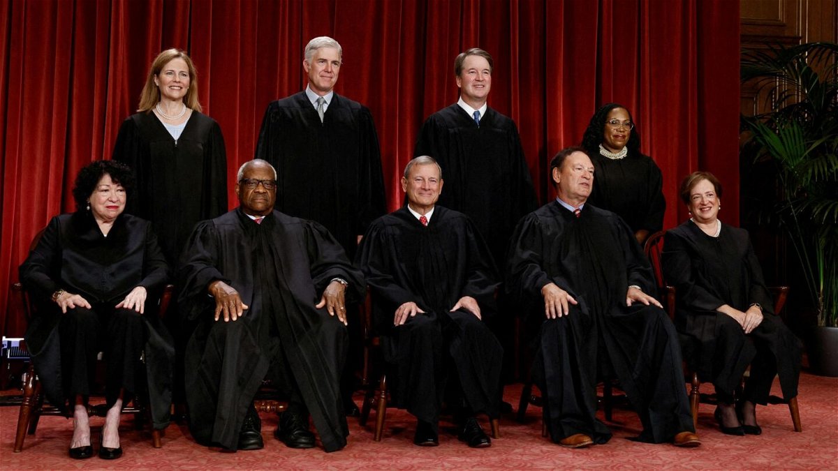 <i>Evelyn Hockstein/Reuters</i><br/>The Supreme Court justices pose for their group portrait at the Supreme Court in Washington