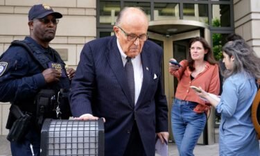 Former New York City Mayor Rudy Giuliani departs federal court on Friday