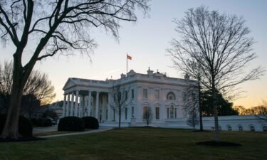 The White House is seen at sunrise in Washington