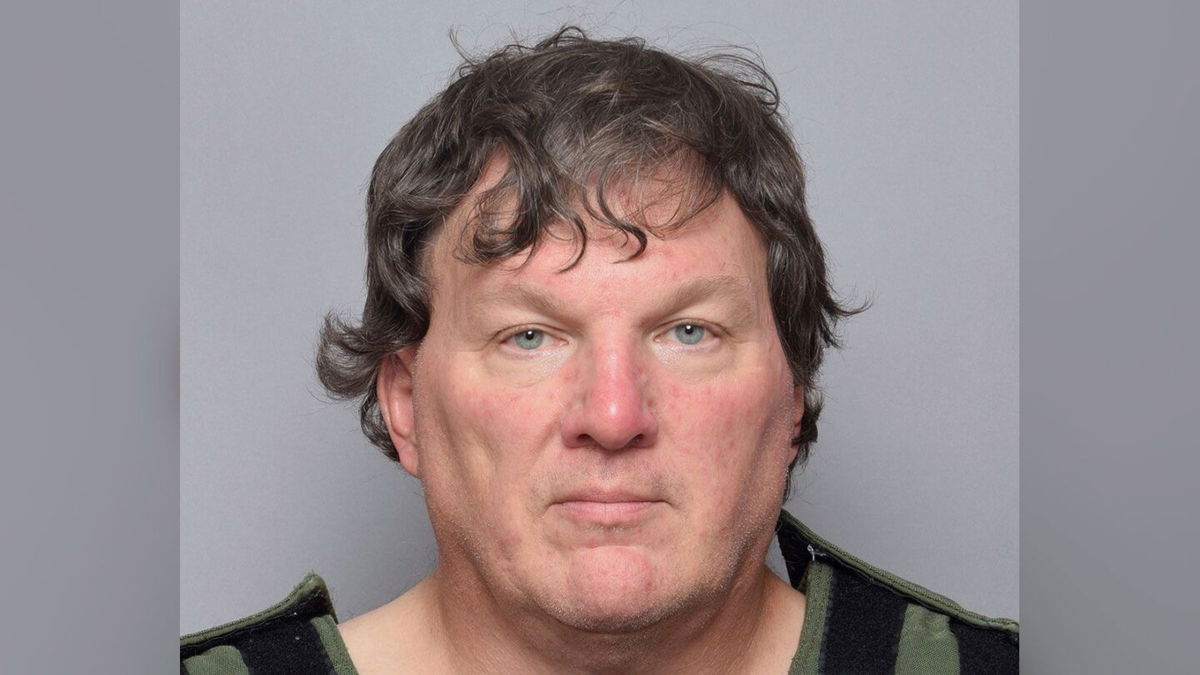 <i>Suffolk County Sheriff's Office/AP</i><br/>Rex Heuermann is shown in a booking photo on July 14. The architect accused in a string of Long Island killings has been years late in paying hundreds of thousands of dollars in taxes