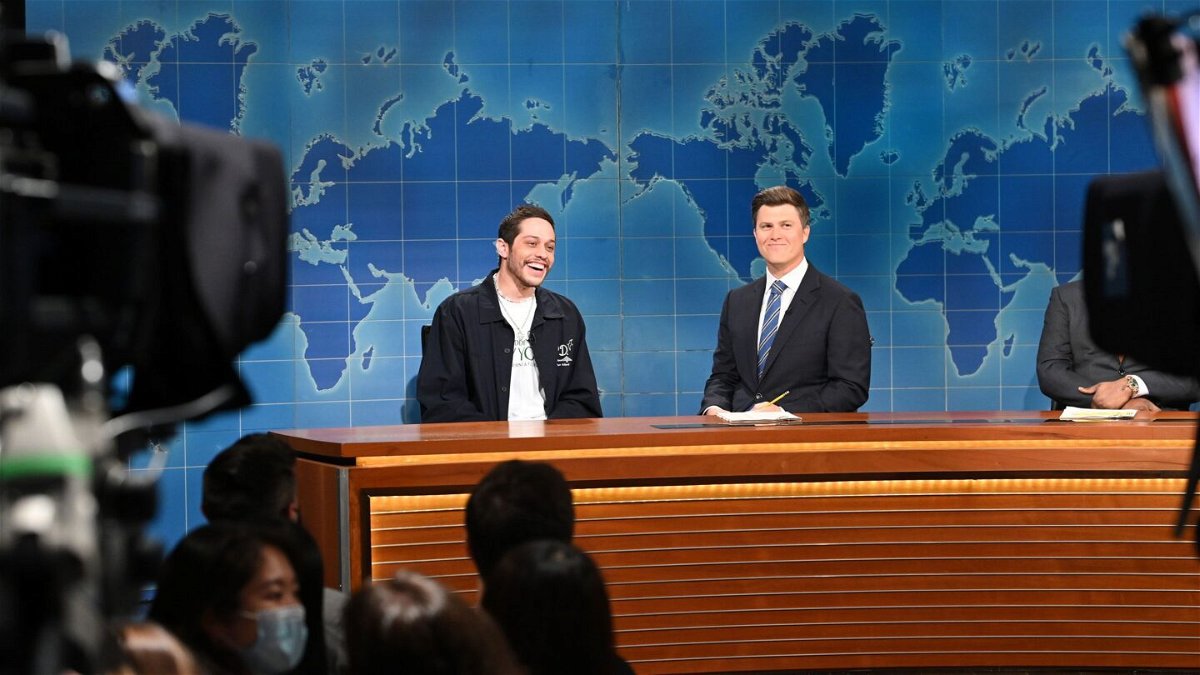 <i>Will Heath/NBC/Getty Images</i><br/>Pete Davidson and anchor Colin Jost during Weekend Update in 2022.