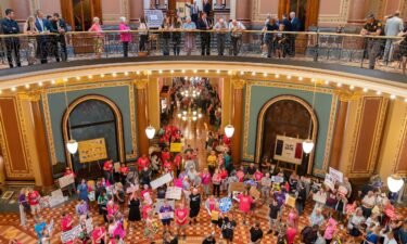 Demonstrators fill the Iowa Capitol rotunda as the Iowa Legislature convenes for a special session to pass a 6-week 'fetal heartbeat' abortion ban on July 11.