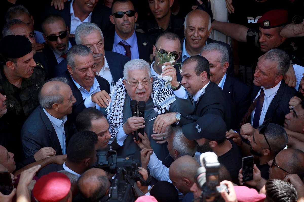 <i>Issam Rimawi/Anadolu Agency/Getty Images</i><br/>Palestinian President Mahmoud Abbas addresses the crowd during his visit to Jenin Refugee Camp