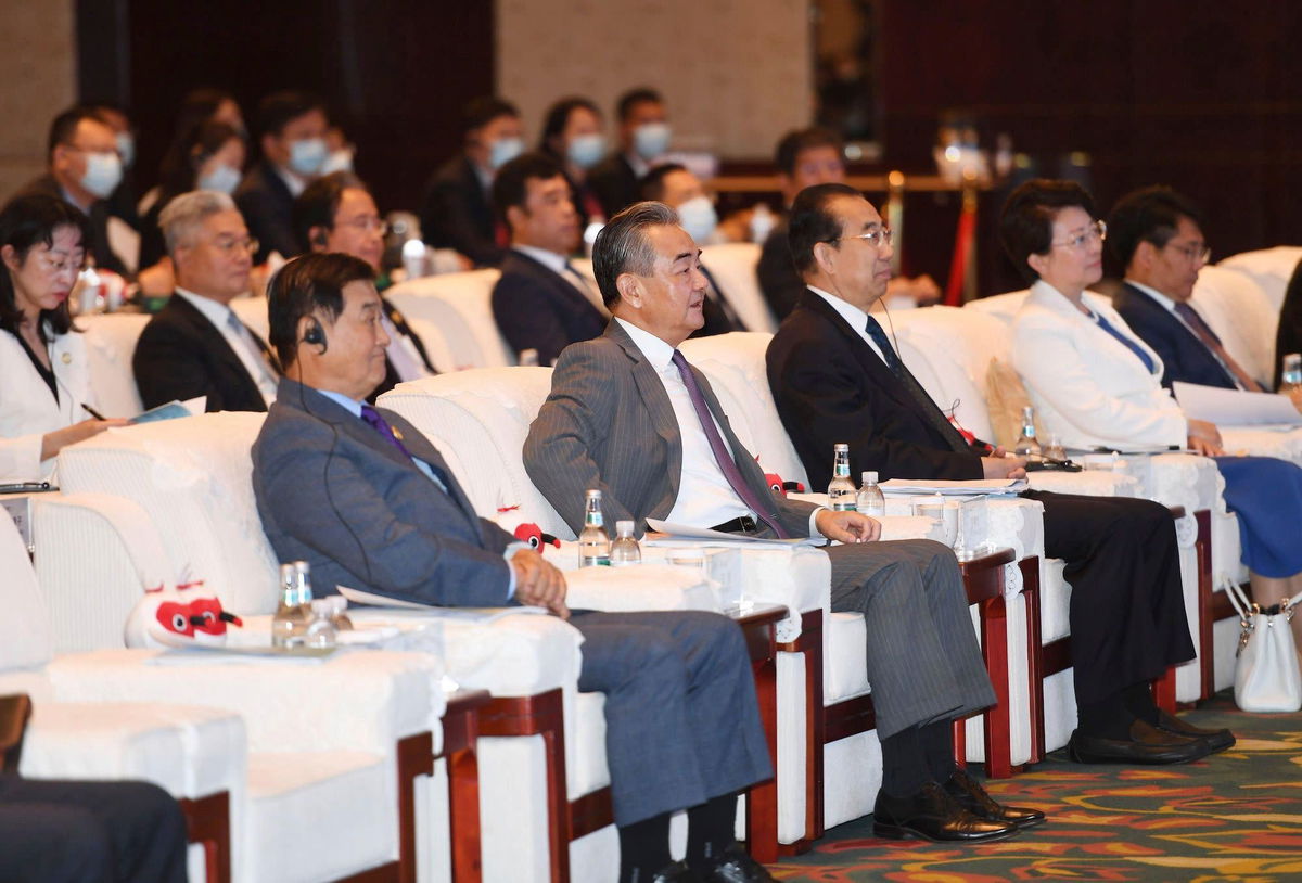 <i>Li Ziheng/Xinhua/Alamy Live News/AP</i><br/>China's top diplomat Wang Yi attends the opening ceremony of the 2023 International Forum for Trilateral Cooperation in Qingdao