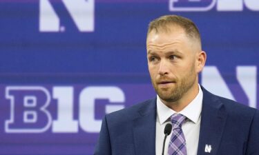 David Braun addresses reporters at the Big Ten Conference media days at Lucas Oil Stadium