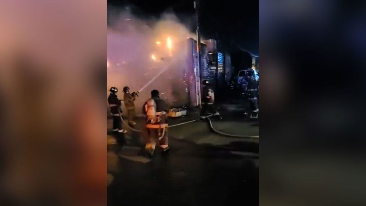 <i>Bomberos San Luis</i><br/>Firefighters fight flames at a bar in Sonora