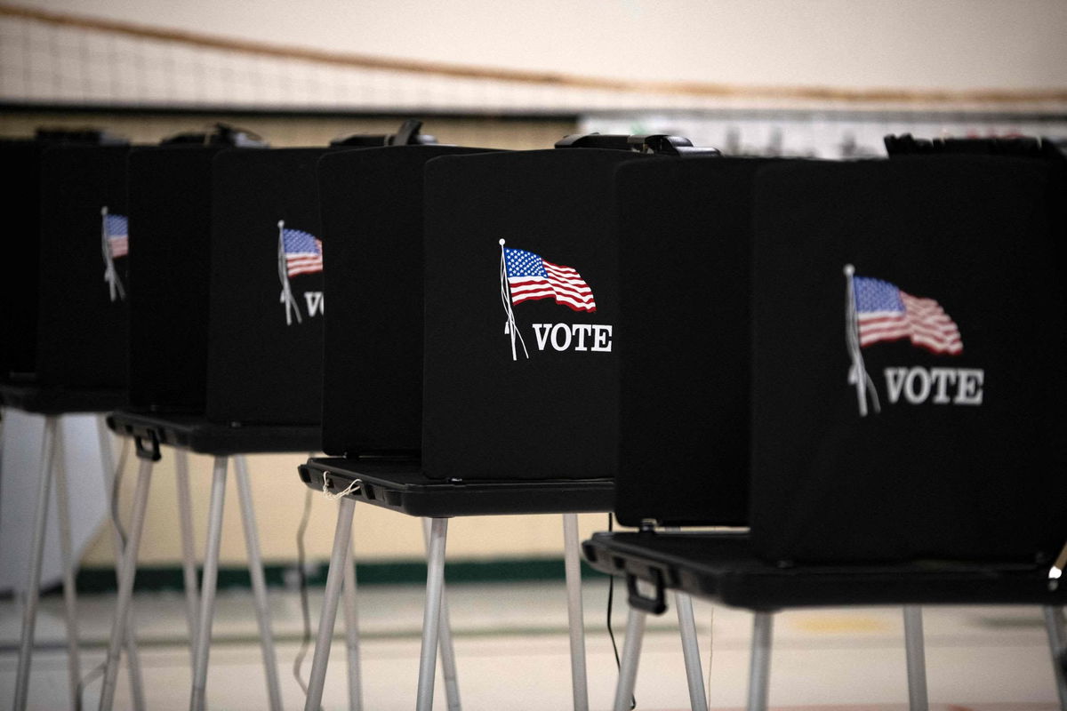 <i>MARK FELIX/AFP/AFP via Getty Images</i><br/>Voting booths are seen at Glass Elementary School's polling station in Eagle Pass