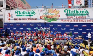 People compete in the 2023 Nathan's hot dog eating contest at Coney Island in New York City on July 4.