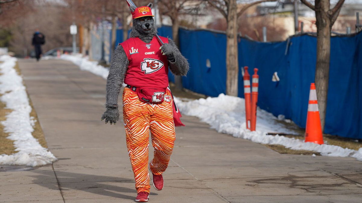 <i>David Zalubowski/AP</i><br/>The self-dubbed ChiefsAholic walks toward the Denver Broncos stadium before an NFL game on January 8