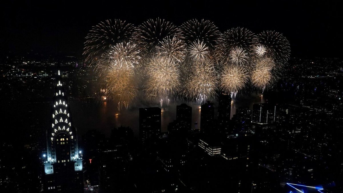 <i>Timothy A. Clary/AFP/Getty Images</i><br/>Fireworks over the East River