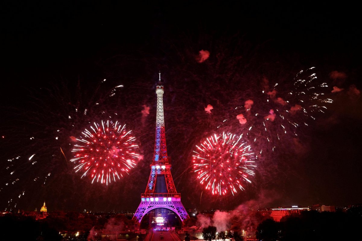 <i>Geoffroy Van der Hasselt/AFP/Getty Images</i><br/>Fireworks explode above the Eiffel Tower as part of the annual Bastille Day celebrations in Paris