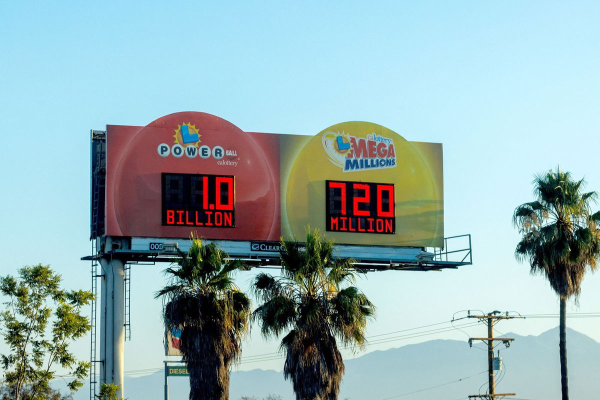 <i>Mike Blake/Reuters</i><br/>A freeway sign displays a 1 billion power ball jackpot and a 720 million Mega Million lottery jackpot in Los Angeles