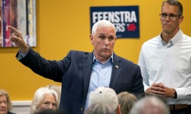 Former Vice President Mike Pence answers questions from the audience during a meet and greet at a Pizza Ranch with Rep. Randy Feenstra