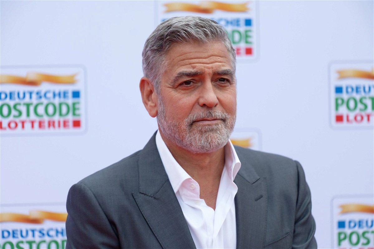 <i>Henning Kaiser/dpa/Getty Images</i><br/>George Clooney seen in May. Clooney has joined the chorus of artists calling for change as actors hit the picket lines in their first strike against film and television studios since 1980.