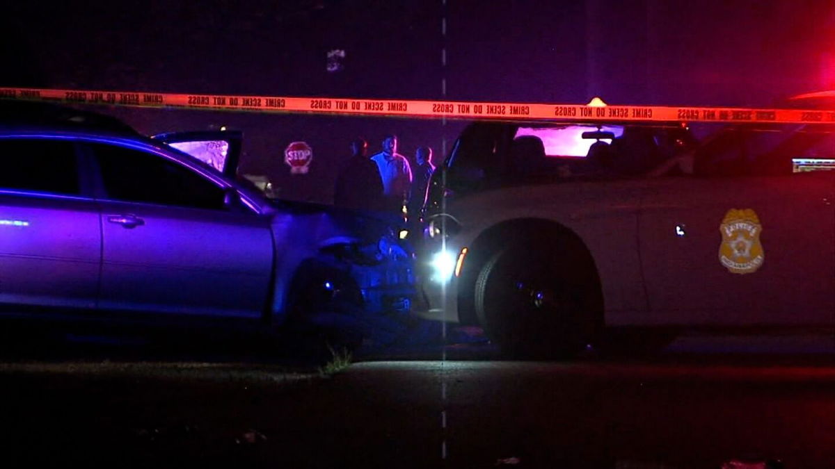 <i>WRTV</i><br/>Investigators work at the scene of a shooting on July 3 at a block party in Indianapolis.