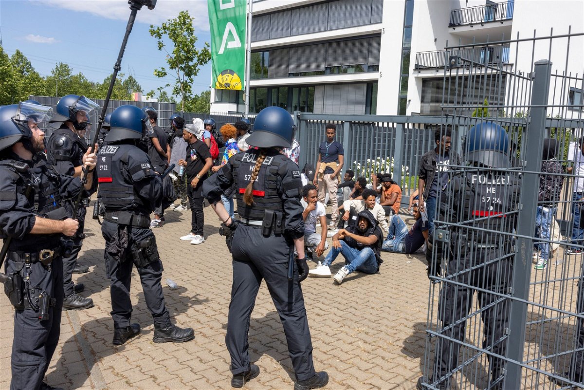 <i>Helmut Fricke/dpa/AP</i><br/>At least 22 police officers were injured in unrest in the western German town of Giessen during an Eritrean cultural festival