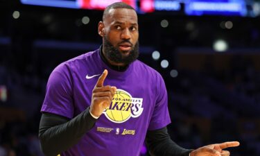 LeBron James of the Los Angeles Lakers warms up before playing against the Denver Nuggets in Game 3 of the Western Conference Finals in Los Angeles on May 20.