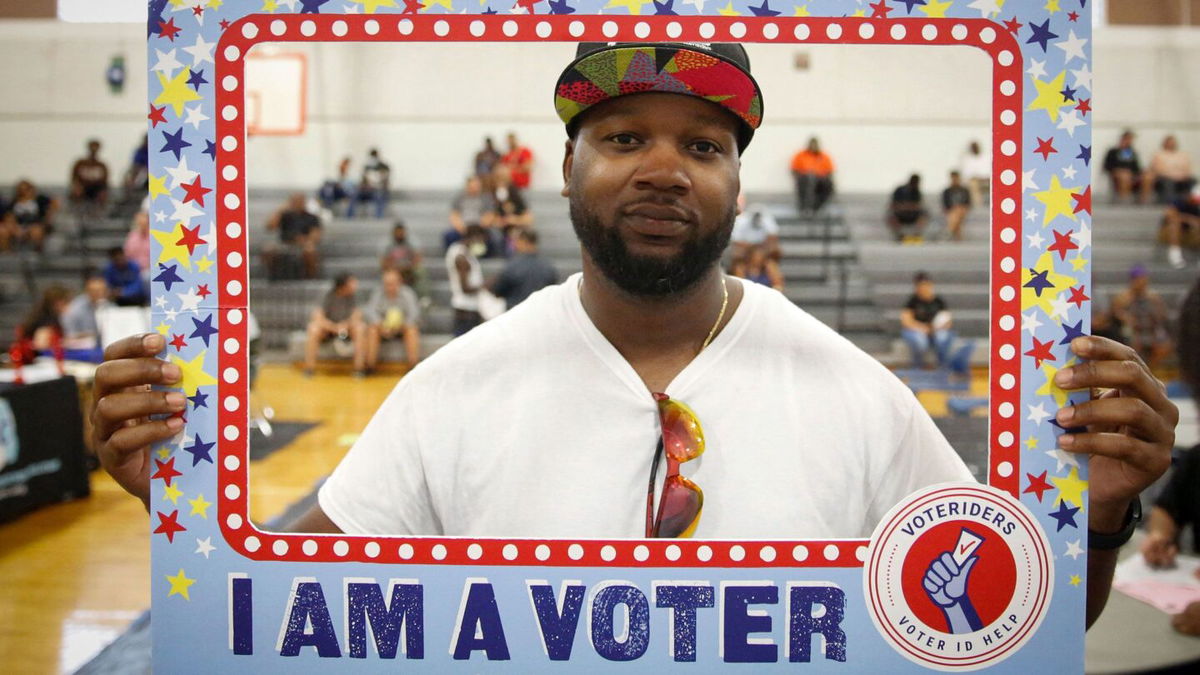 <i>Marco Bello/AFP/Getty Images</i><br/>Jose Irby poses for a portrait during an event held by the Florida Rights Restoration Coalition to clear the fines and fees of dozens of Florida residents with past felony convictions