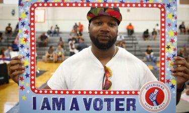 Jose Irby poses for a portrait during an event held by the Florida Rights Restoration Coalition to clear the fines and fees of dozens of Florida residents with past felony convictions