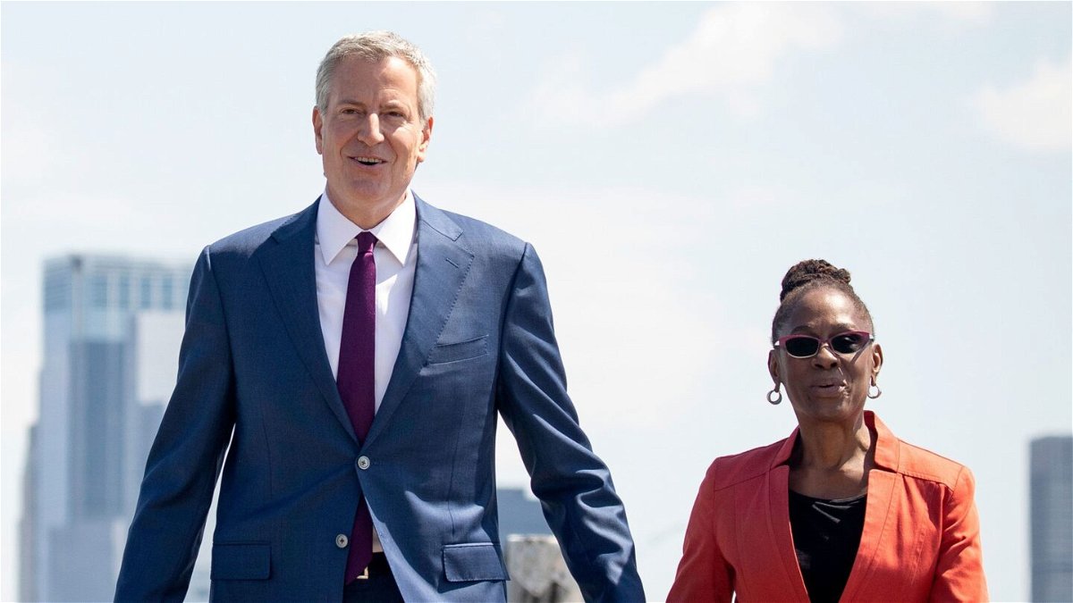 <i>Drew Angerer/Getty Images</i><br/>New York City Mayor Bill de Blasio (left) and his wife Chirlane McCray arrive for a dedication ceremony for the new Statue of Liberty Museum