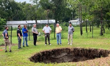 This photo provided by Florida's Hillsborough County shows a sinkhole that killed man in 2013.