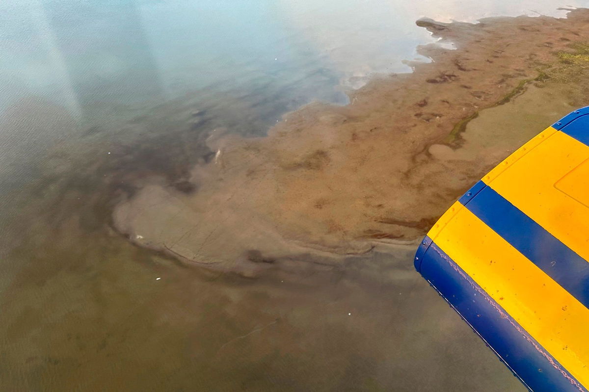 <i>North Slope Borough/AP</i><br/>This photo provided by North Slope Borough shows an aerial view of a shallow lake where helicopter debris was found on Alaska's North Slope near Utqiagvik