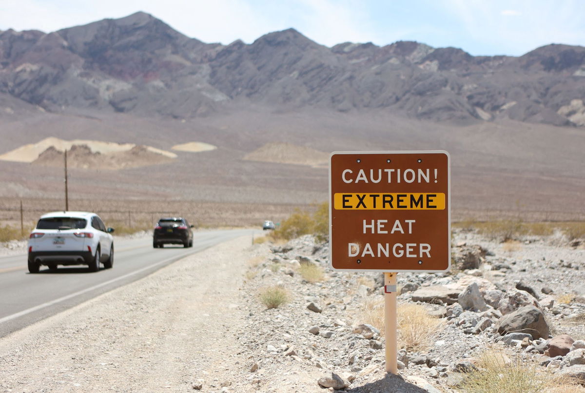 <i>Ronda Churchill/AFP/Getty Images</i><br/>A heat advisory sign is shown along Highway 190 during a heat wave in Death Valley National Park in Death Valley