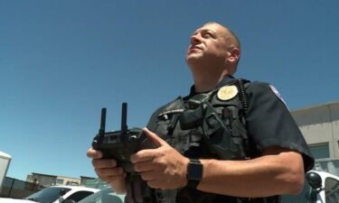 The UTA police begin a drone program to combat crime and provide first aid. Officer Alex Blauer is pictured piloting one of the new drones.