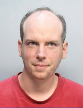 <i>Miami police/WFOR</i><br/>Jonathan Goldenberg is accused of taking cellphone pictures up a young girl's skirt at a public library in Kendall.