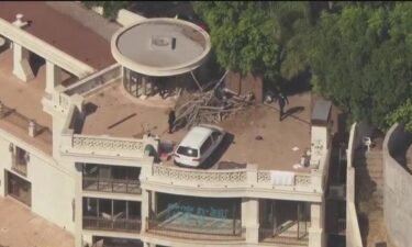 A multimillion-dollar mansion in the Hollywood Hills was vandalized Thursday by what police say was a group of squatters.