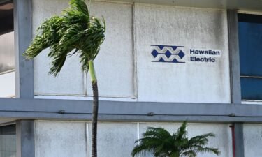 The Hawaiian Electric logo is displayed outside the electric power utility company's office in the aftermath of the Maui wildfires in Kahului