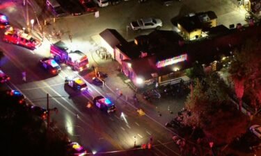 Police respond Wednesday to the shooting at a bar in Trabuco Canyon