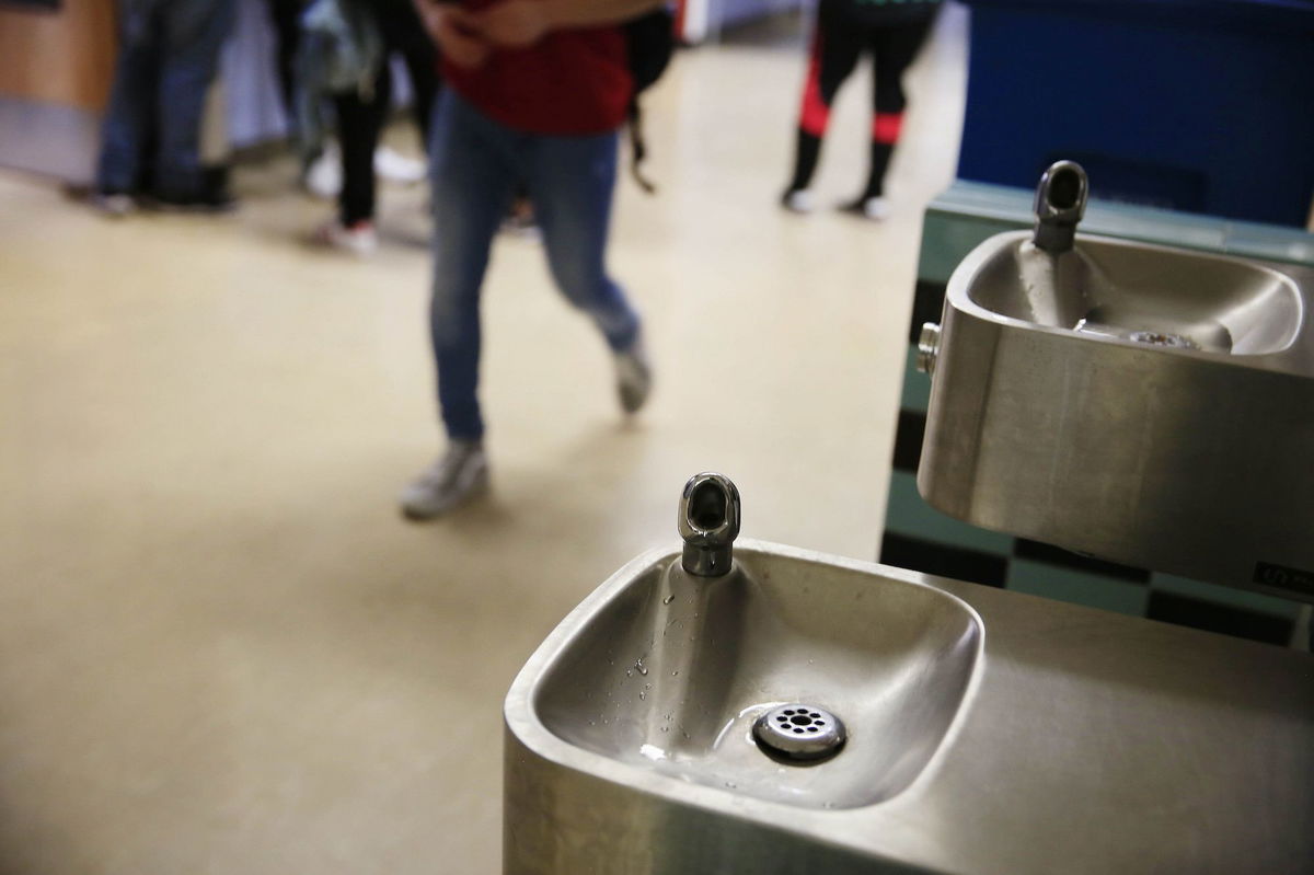 Increased access to drinking water could improve kids' health, a new study found. A hallway water fountain is shown in San Francisco International High School in California's Bay Area in October 2017.