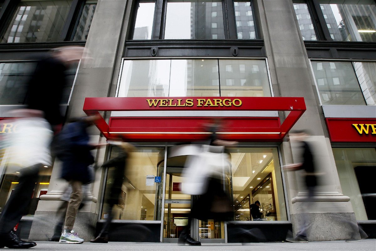 <i>Leonardo Munoz/Corbis/Getty Images</i><br/>People walk past a Wells Fargo branch on January 10