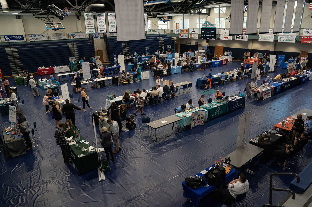 <i>Allison Joyce/Bloomberg/Getty Images</i><br/>Attendees at a career fair at a community college in Bolivia