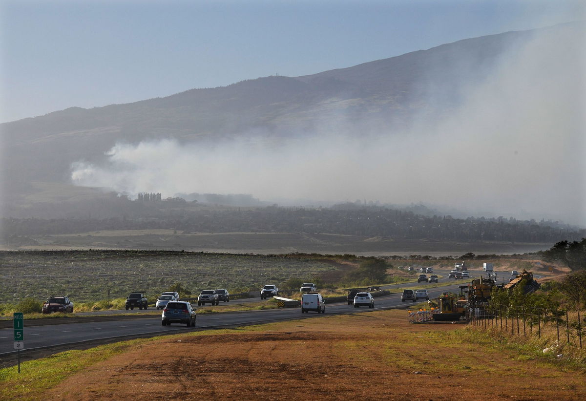 <i>Matthew Thayer/The Maui News/AP</i><br/>Smoke blows across the slope of Haleakala volcano on Maui